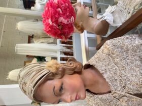 mannequins wearing headpieces.