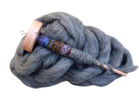 Drop spindle with wool