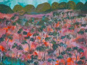 Painting in pinks and greens of bushy hills