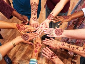 Mehndi designs on people's hands