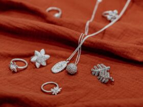 Sterling silver jewellery on a red background