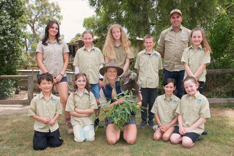 Group of children as zoo keepers