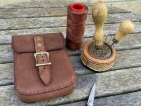 Leather pouch with brushes