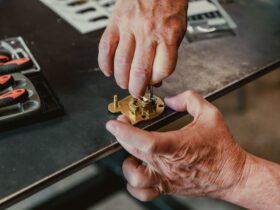 Close up of hands making locksmith on a work bench