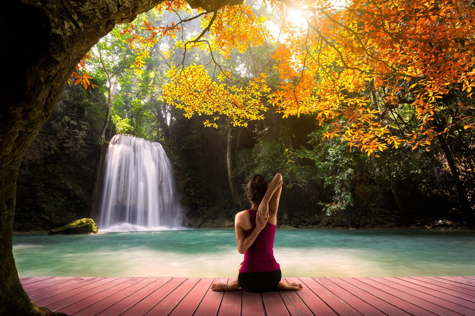 Lady Meditating At Waterfall