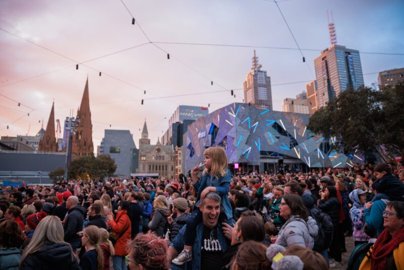 A crowd at Federation Square for 10,000 Kazoos, 2023.