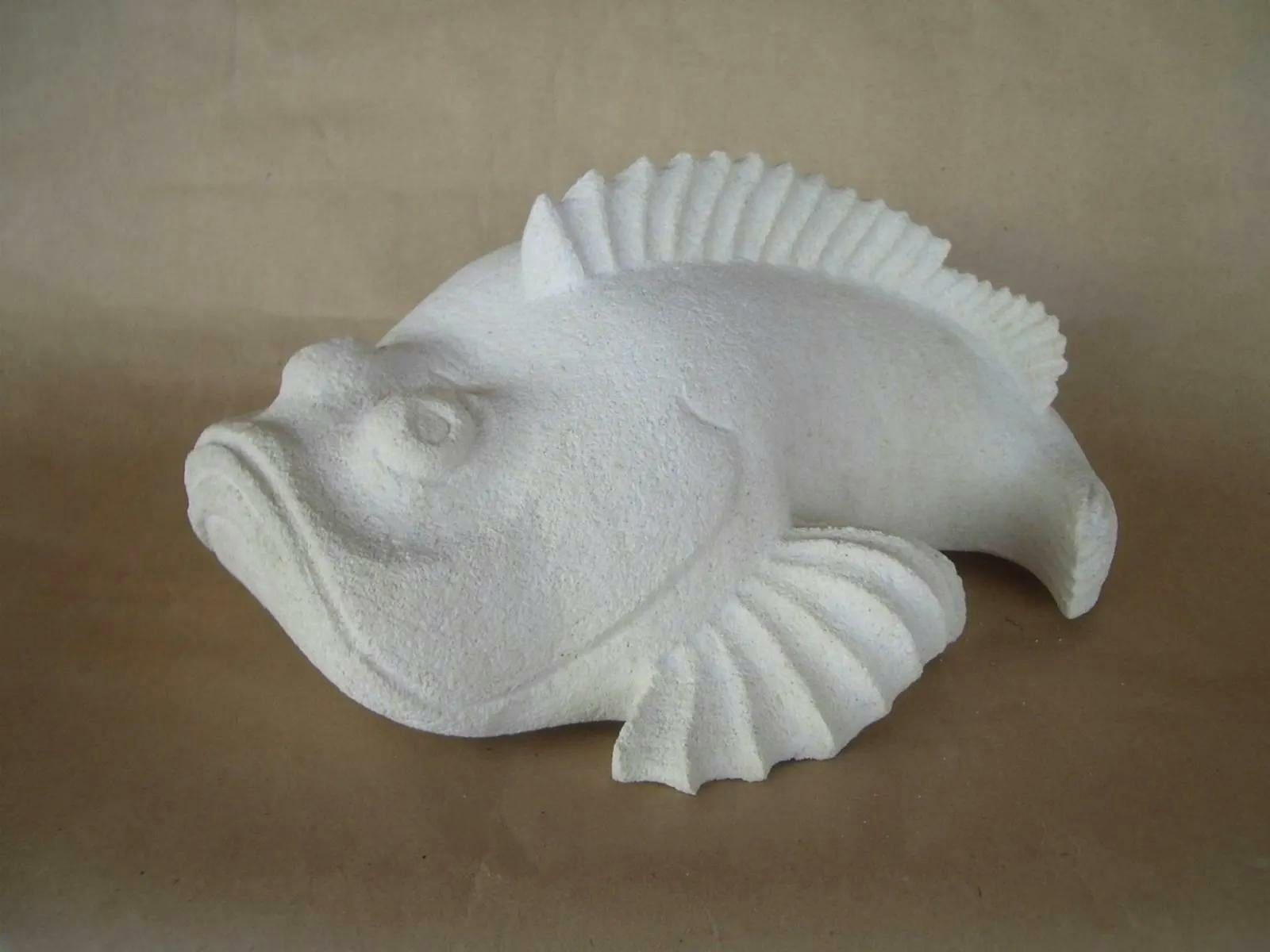 Carved limestone fish