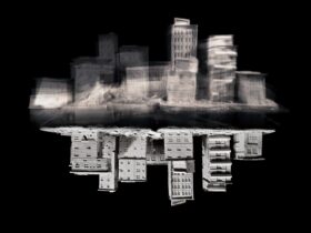 Black and white image of sculptural cityscape with reflection