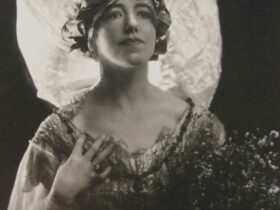 Photograph of artist Hilda Rix Nicholas, c. 1920, dressed as "the spirit of the bush".