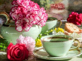 Cup of tea and a teapot with flowers