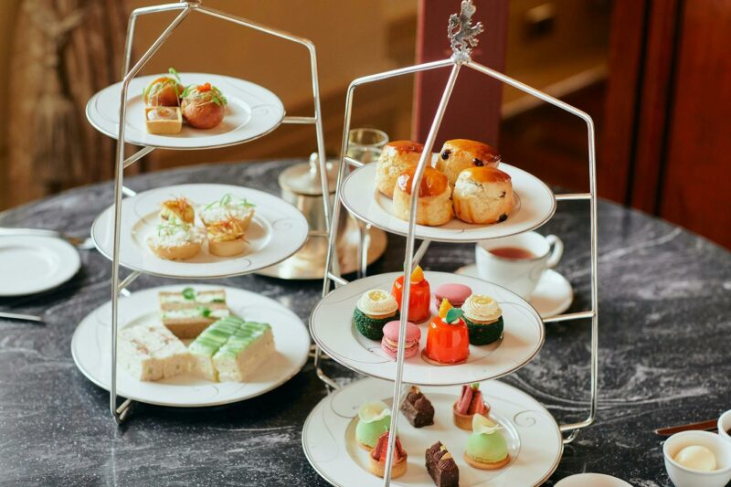 Two Afternoon Tea stands with Champagne and tea