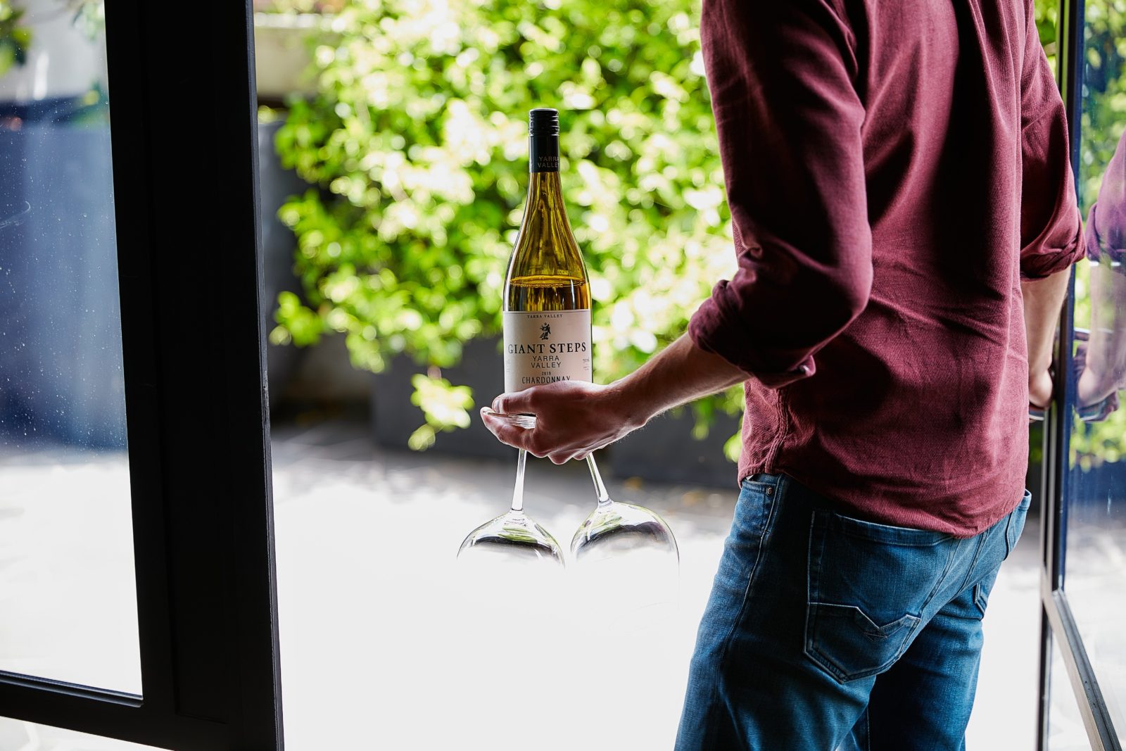 A Giant Steps Chardonnay being tasted in the courtyard.