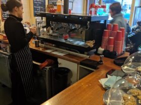 Barista making coffee Main Street Cafe