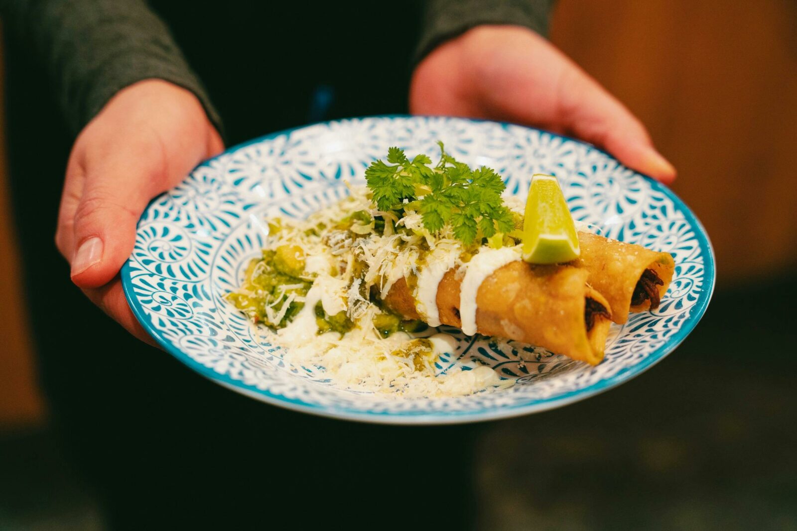 Better known as golden taco (dorados) from Hidalgo: Steamed Lamb+ sour cream +cotija cheese + avo.