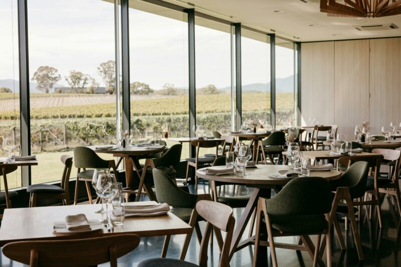 The casual elegance of the Oakridge Restaurant dining room with panoramic vineyard and mountain view