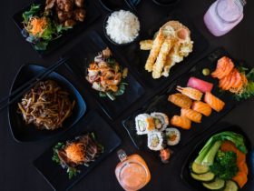 A table filled with an assortment of Japanese food