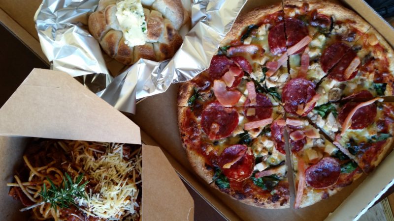 Takeaway pizza pasta and garlic bread from REAL Pizza Pasta Salads