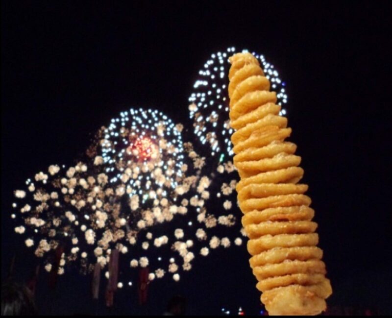 spiral potato in front of fireworks