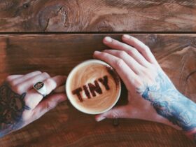 Hands holding coffee cup