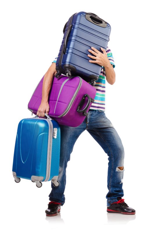 Man struggling with suitcases