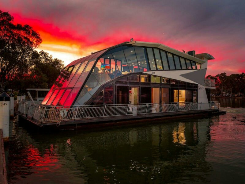 a sunset image of the boathouse