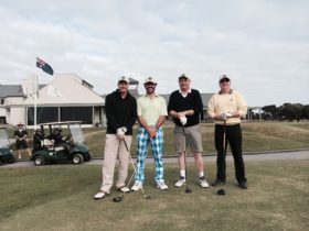 Happy golfers at 13th Beach
