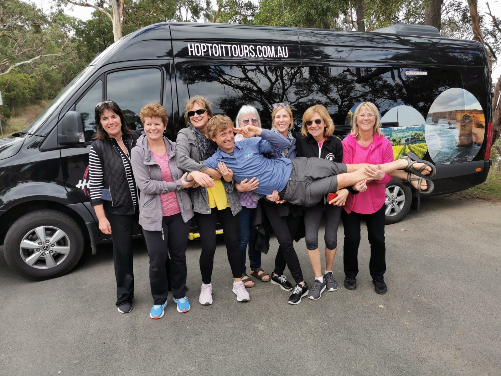 Private tour group with Hop To It Tours bus