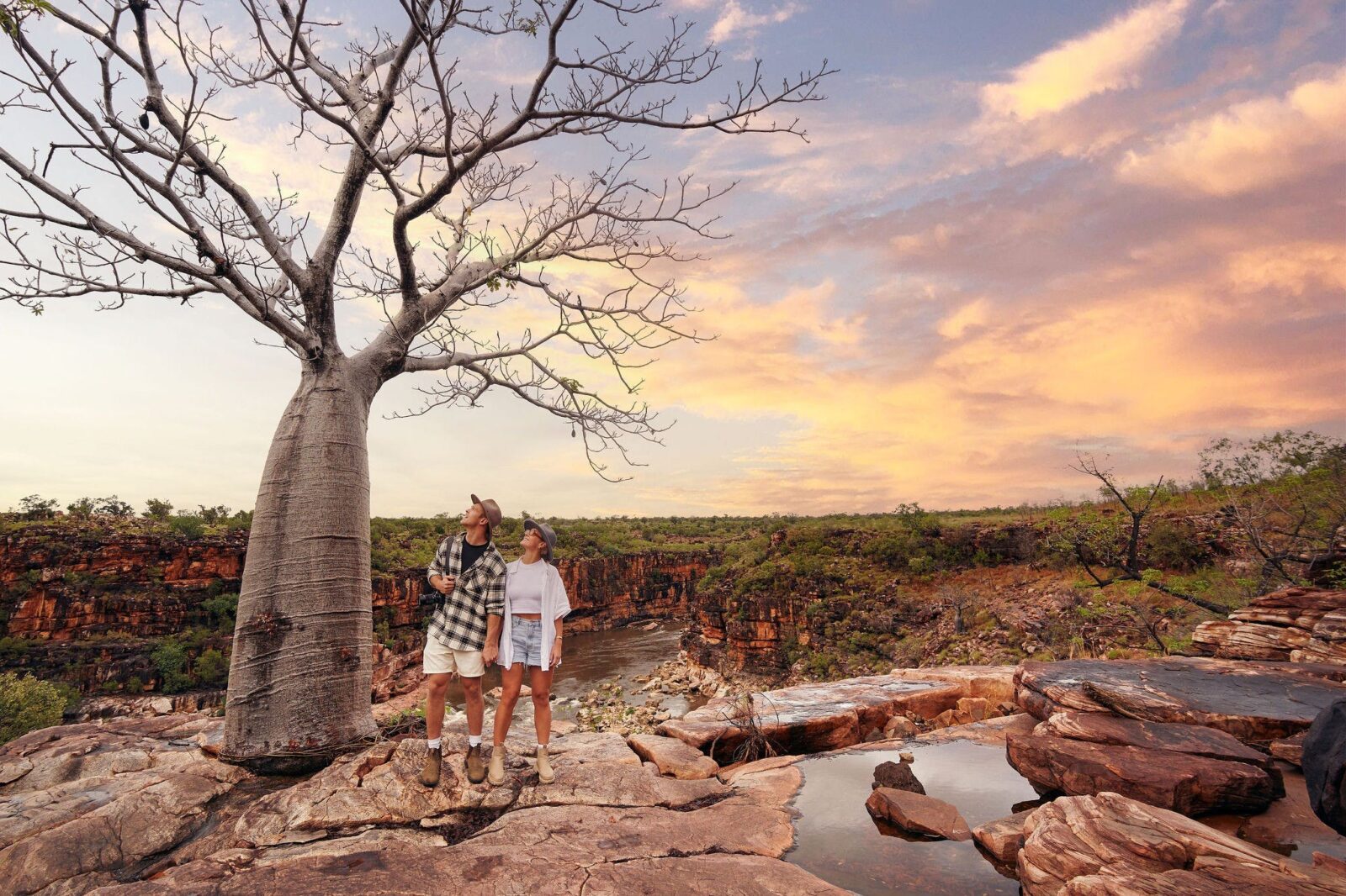 Couple standing next to a boab tree