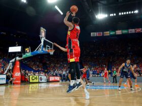 Perth Wildcats star player Corey Webster shoot from the three point line