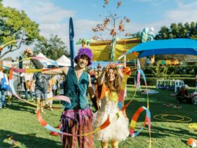 Two entertainers with twirling ribbons at the Pinjarra Festival