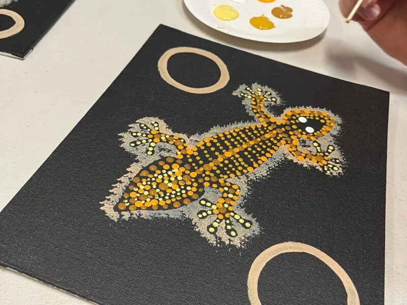 Close up of painting of lizard.