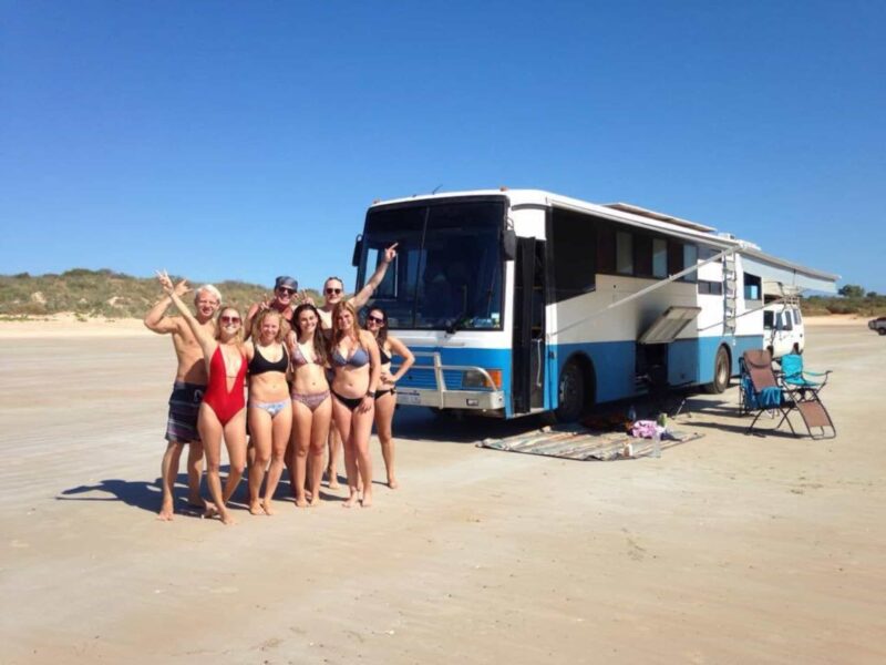 A happy group enjoying being parked on Cable Beach in Broome