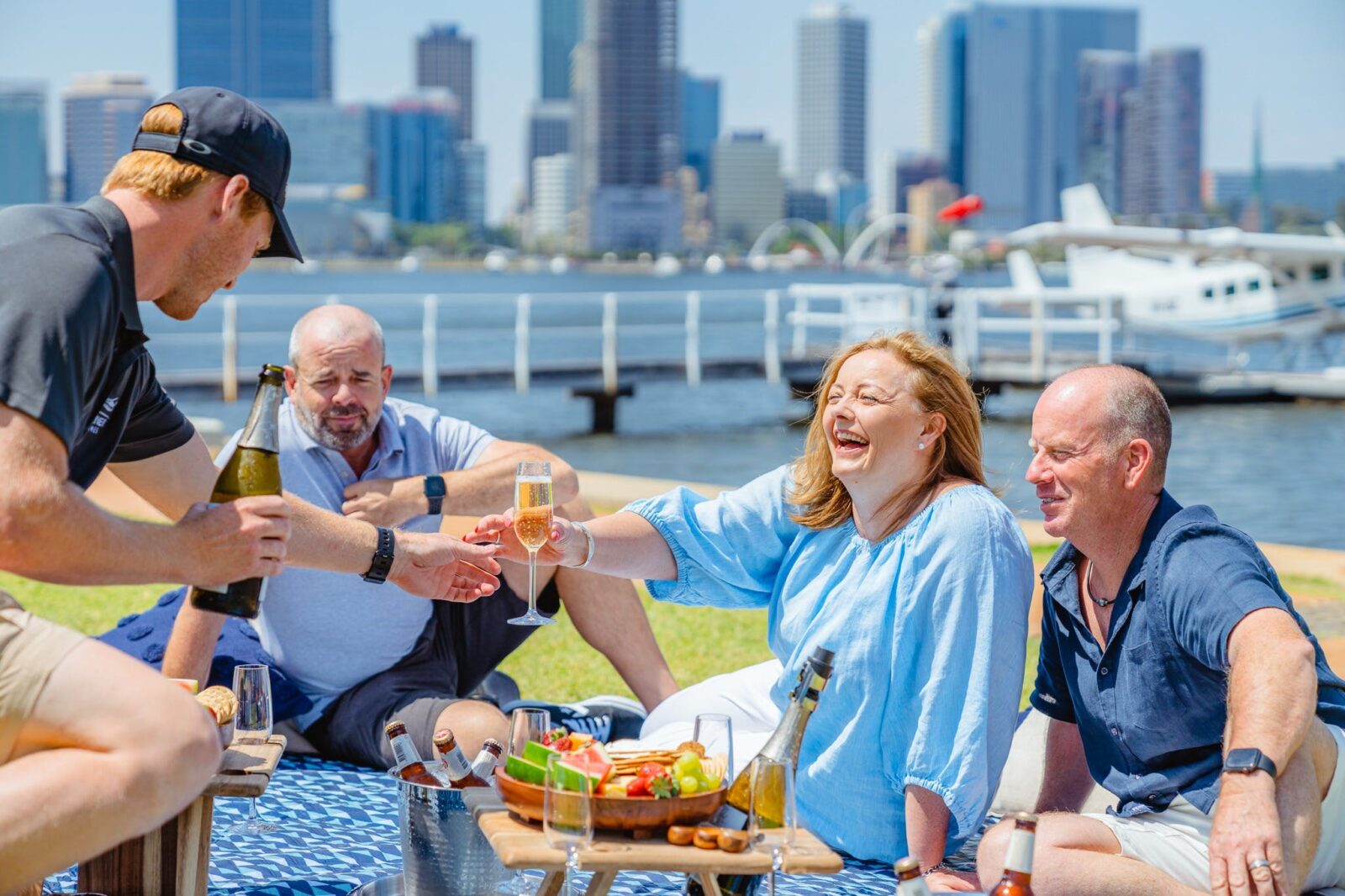 Part of the Sip & Scenic package, customers enjoy a picnic on the South Perth foreshore pre flight.